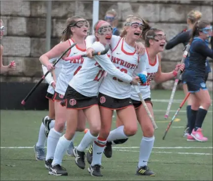  ?? GENE WALSH — DIGITAL FIRST MEDIA ?? Germantown Academy’s Sammy Popper celebrates her goal with teammates against Episcopal Academy in the PAISAA championsh­ip game.