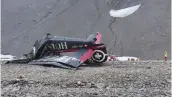  ?? — AP ?? The wreckage of the old- time propeller plane Ju 52 after it went down went down on Saturday on the Piz Segnas mountain above the Swiss Alpine resort of Flims.