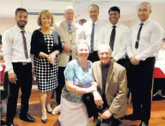  ??  ?? Left: Pictured are the Mayor and Mayoress of Charnwood, Coun David Gaskell and wife Jan, with Marj and Mike Jones, kneeled, proprietor Mitu, left of Coun David Gaskell, and restaurant staff at Eastern Spice Restaurant.