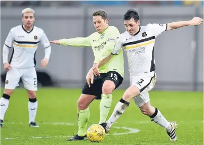  ?? Picture: SNS Group. ?? Mark Docherty, right, in action for Dumbarton against Hibs in January.