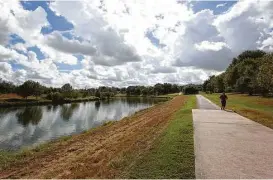  ?? Jon Shapley / Houston Chronicle ?? A proposed $5.9 million bike and pedestrian bridge in East Houston’s Mason Park will allow visitors to safely cross Brays Bayou and better access trails.