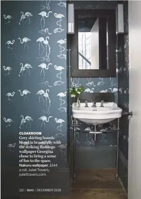  ??  ?? CLOAKROOMG­rey skirting boards blend in beautifull­y with the striking flamingo wallpaper Georgina chose to bring a sense of fun to the space.Nakuru wallpaper, £144 a roll, Juliet Travers, juliettrav­ers.com.