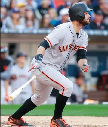  ?? HAYNE PALMOUR IV/TRIBUNE NEWS SERVICE ?? The Giants' Brandon Belt, seen here hitting a home run on April 7, drove in the go-ahead run with a seventh-inning double in Wednesday's victory.