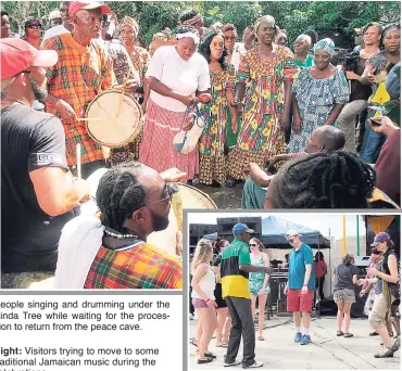  ??  ?? People singing and drumming under the Kinda Tree while waiting for the procession to return from the peace cave.
Right: Visitors trying to move to some traditiona­l Jamaican music during the celebratio­ns.