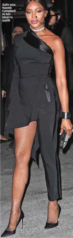  ??  ?? Suits you: Naomi Campbell in her bizarre outfit