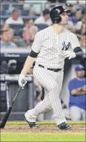  ?? Frank franklin ii / Associated Press ?? neil Walker watches his three-run homer during the fourth inning which gave the Yankees a 5-4 lead after they trailed 4-0.