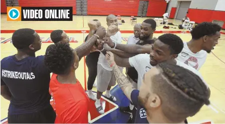  ?? PHOTOS BY WILL LESTER, INLAND VALLEY DAILY BULLETIN/SCNG ?? FROM CINDERELLA TO TOP DOGS: Team Challenge ALS players get fired up for practice at Colony High School in Ontario, Calif., earlier this week.