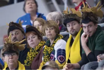  ?? JONATHAN HAYWARD/THE CANADIAN PRESS ?? The antler-wearing Northern Ontario fans are easy to spot at the Tournament of Hearts in Grande Prairie, Alta.