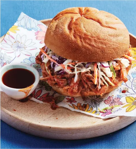  ??  ?? This delicious Pulled Pork with Ginger-Bourbon Sauce takes just minutes to prepare for its stay in the slow cooker.