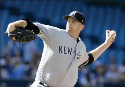  ?? FRED THORNHILL — THE CANADIAN PRESS VIA AP ?? Yankees starting pitcher James Paxton throw against the Toronto Blue Jays.