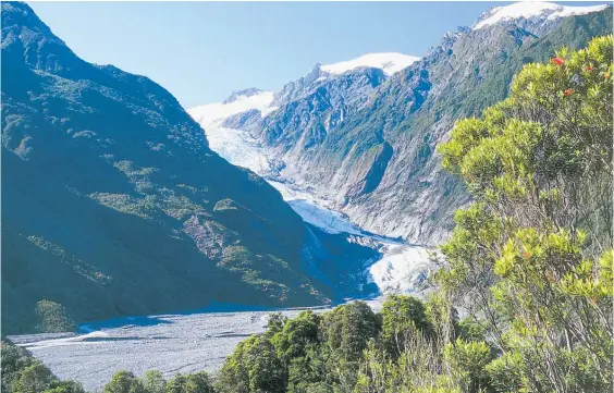  ?? Photo / Getty Images ?? Franz Josef has just over 500 residents but more than half a million tourists arrive each year, with up to 6000 visiting the glacier daily.