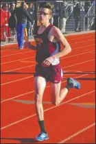  ?? Submitted photo ?? GOLDEN RELAY: Skylar Davis, pictured, ran with Lake Hamilton teammates Dylan Stephens, Colby Swecker and Cody Weldon Thursday in Benton to a first-place time of 8:17.24 in the boys’ 4x800-meter relay. The Wolves won the 13-school meet with 108 points.