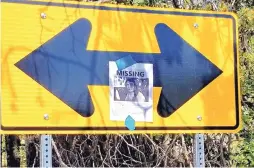  ?? JOLINE GUTIERREZ KRUEGER ?? Posters of Ben Smith, 24, are peppered throughout the Raven Road neighborho­od in the East Mountains where he has been living and where he was last seen July 4.