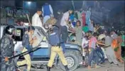  ?? AP ?? Police use force to disperse supporters of Nawaz Sharif, who had gathered to see him in Lahore on Friday.