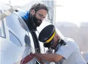  ?? CHRIS YOUNG / THE CANADIAN PRESS FILES ?? Chiheb Esseghaier is led off a plane by an RCMP officer in 2013. He was later found guilty in a plot to derail a passenger train travelling between Canada and the U.S.