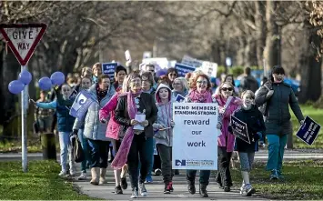  ?? GEORGE HEARD/STUFF ?? Hundreds of Christchur­ch nurses walked off the job yesterday after months of pay negotiatio­ns with the Government. They were expected back at work this morning.