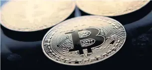  ?? JUSTIN TALLIS/AGENCE FRANCE-PRESSE ?? A research paper is likely to stoke debate about how much of bitcoin’s skyrocketi­ng gain last year was caused by the covert actions of a few big players, rather than real demand from investors.