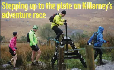  ?? Photo by Valerie O’Sullivan ?? That’s the ‘stile’… Athletes competing in Quest Killarney March Adventure Race - a one-day multi adventure sport race, through Killarney National Park, along the Kerry Way and the Black Valley.