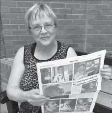  ?? Photo by Sherri Gallant ?? Penny Craig smiles while reading about her late brother Peter Craig in the Fort Macleod Gazette.