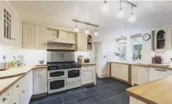  ??  ?? DESIGNER: The bespoke kitchen in the property