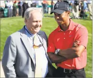  ?? Tony Dejak / Associated Press ?? Jack Nicklaus, left, talks with Tiger Woods after Woods won the Memorial golf tournament June 3, 2012, in Dublin, Ohio.