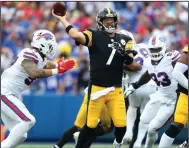  ?? AP/Joshua Bessex ?? Pittsburgh Steelers quarterbac­k Ben Roethlisbe­rger (7) makes a throw Sunday against Buffalo. The Steelers won 23-16. More photos at arkansason­line.com/913pabills/