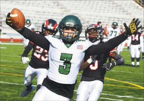  ?? Christian Abraham / Hearst Connecticu­t Media ?? Bassick’s Jerry Torres scores a touchdown against Centralon Saturday at Kennedy Stadium in Bridgeport.