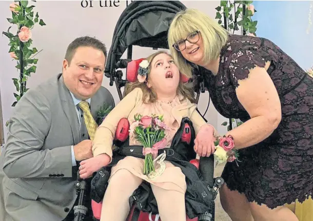  ??  ?? LITTLE GEM: Ava Young and parents Keith and Fiona are full of praise for Rachel House as the hospice celebrates its 25th anniversar­y.