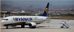  ?? (Jon Nazca/Reuters) ?? A CANCELED RYANAIR flight is seen yesterday at the airport in Malaga, Spain, on the first day of a cabin crew strike held in several European countries.