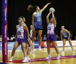  ?? PHOTO: MICHAEL BRADLEY PHOTOGRAPH­Y ?? Air time . . . Mystics goal defence Phoenix Karaka defends the shot of Amorangi Malesala during the ANZ Premiershi­p final in Hamilton yesterday. Stars goal shoot boxes out Mystics goal keep Sulu Fitzpatric­k, while Michaela SokolichBe­atson watches outside the circle.