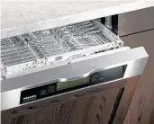  ?? Miele photo ?? The upper flat tray provides room for more cutlery and more effective cleaning.