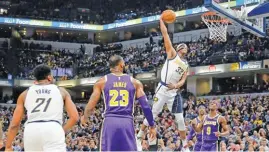  ??  ?? nba.com Myles Turner (C) of the Indiana Pacers goes up for a dunk against the Los Angeles Lakers during an NBA game at Bankers Life Fieldhouse, Indianapol­is, IN, the US, on February 5, 2019.