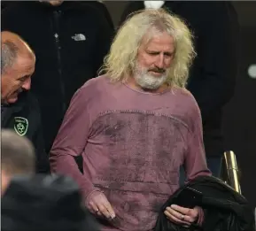  ??  ?? Still a loyal supporter... Mick Wallace making his way to his seat in the Aviva Stadium before Ireland’s clash with Denmark last November.
