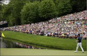  ?? MATT SLOCUM — THE ASSOCIATED PRESS ?? Jordan Spieth waits to putt on the 16th hole during the fourth round of the Masters in 2015.