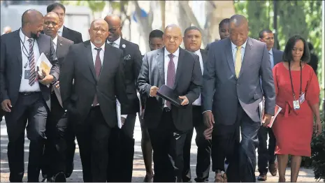  ?? PHOTO: DAVID RITCHIE ?? Former Finance Minister Pravin Gordhan flanked by his former deputy, Mcebisi Jonas, and outgoing director-general Lungile Fuzile.