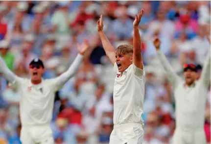  ?? – Reuters ?? MAN OF THE MOMENT: England’s Sam Curran celebrates taking the wicket of India’s Hardik Pandya (not pictured) during the first test at Edgbaston, Birmingham.