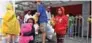  ?? - Reuters ?? FLOODING: Evacuees carry their belongings outside of the George R. Brown Convention Centre where people have taken refuge, in Houston, Texas, U.S. on Tuesday.