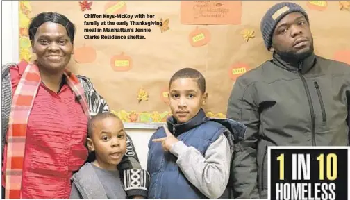  ??  ?? Chiffon Keys-McKoy with her family at the early Thanksgivi­ng meal in Manhattan’s Jennie Clarke Residence shelter.