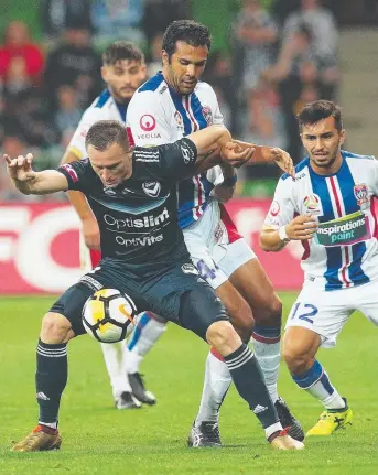  ?? Picture: GETTY ?? MASTERFUL: Besart Berisha of Melbourne Victory keeps the Jets at bay.