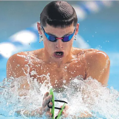  ?? Picture: PA. ?? Former Strathalla­n School pupil Duncan Scott in training at a media day at Stirling University.