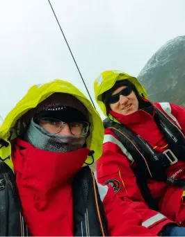  ??  ?? CLOCKWISE FROM RIGHT: Layered up while sailing past the tiny island of Støtt
Anchoring is free everywhere in Norway
Celebratin­g at Renga after sailing into the Arctic Circle
Aina the labrador adapted well to life on a 27ft yacht