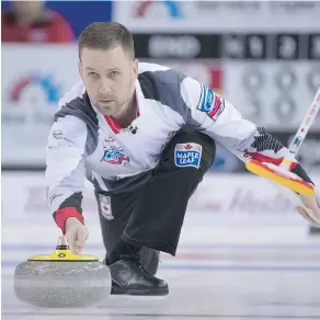  ?? JONATHAN HAYWARD / THE CANADIAN PRESS ?? Team Canada skip Brad Gushue makes a shot during the 12th draw against the Netherland­s at the World Men’s Curling Championsh­ip.