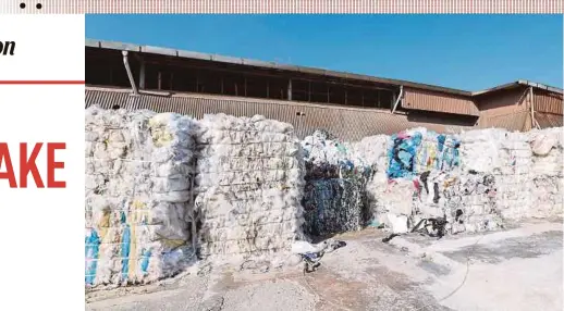  ?? HAQIM ROSMAN PIC BY IQMAL ?? Mountains of recycled plastic waste at an illegal recycling premises in Seremban yesterday.