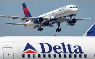  ?? RICH ADDICKS / ATLANTA JOURNAL-CONSTITUTI­ON ?? Delta Air LInes has come under fire from conservati­ves for discontinu­ing its discounts for members of the National Rifle Associatio­n in the wake of the massacre at a high school in Parkland, Fla., last month. Chief among the critics is Georgia Lt. Gov....