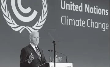  ?? YVES HERMAN Pool/AFP via Getty Images/TNS ?? President Joe Biden speaks Monday at the COP26 climate summit in Glasgow, Scotland. He mused about whether ‘future historians’ would say ‘we let this final chance to stem the crisis slip through our fingers’ or ‘in the 2020s, we stepped up.’