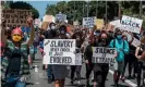  ?? Photograph: Mark Ralston/ AFP/Getty Images ?? Social workers join Black Lives Matter members during a demonstrat­ion against racism and police brutality in Los Angeles, on 13 June 2020.