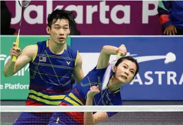  ??  ?? Confirmed: Malaysian mixed doubles shuttlers Chan Peng Soon (left) and Goh Liu Ying have booked their berth in the lucrative BWF World Tour Finals in Guangzhou next month.