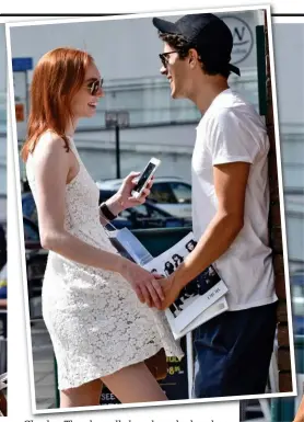  ??  ?? Loved up: Richardson hugs his co-star Cheeky: Then he pulls her closer by her dress