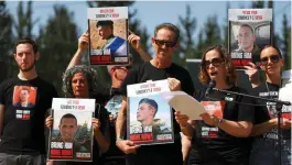  ?? REUTERS ?? Relatives of hostages held by Hamas call for their release yesterday