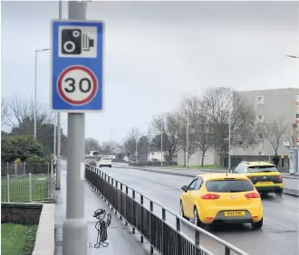  ??  ?? Slow down A temporary speed camera monitoring vehicles for six weeks in Whitletts Road